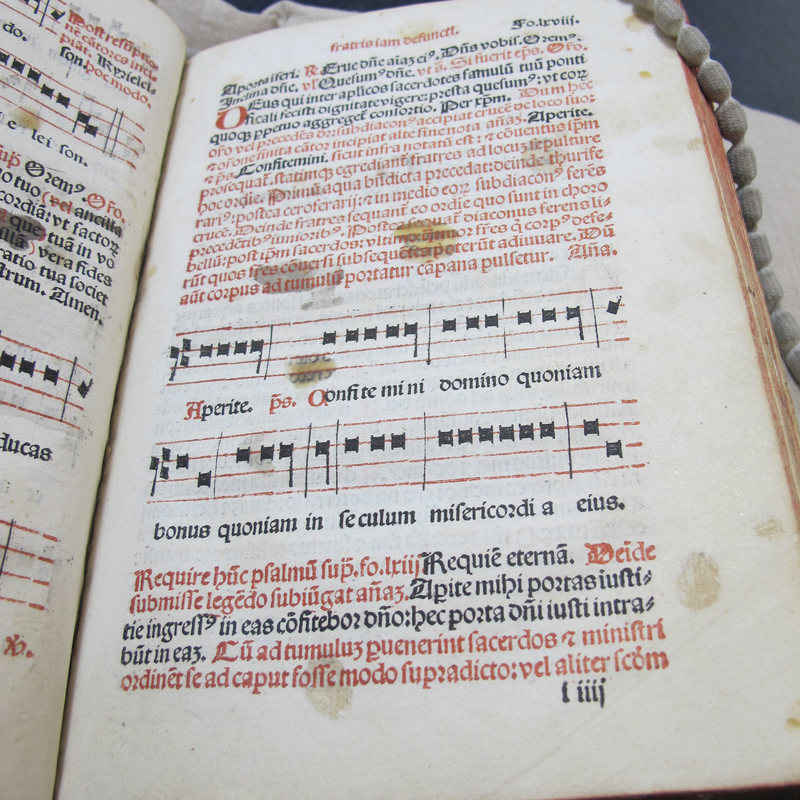 1500s Spanish prayer book in Cambridge University Library, provided to Atlas Obscura for article on dirty books (note wax drippings on page).