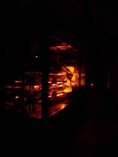 “Photo of workstation showing GPUs in the dark.”